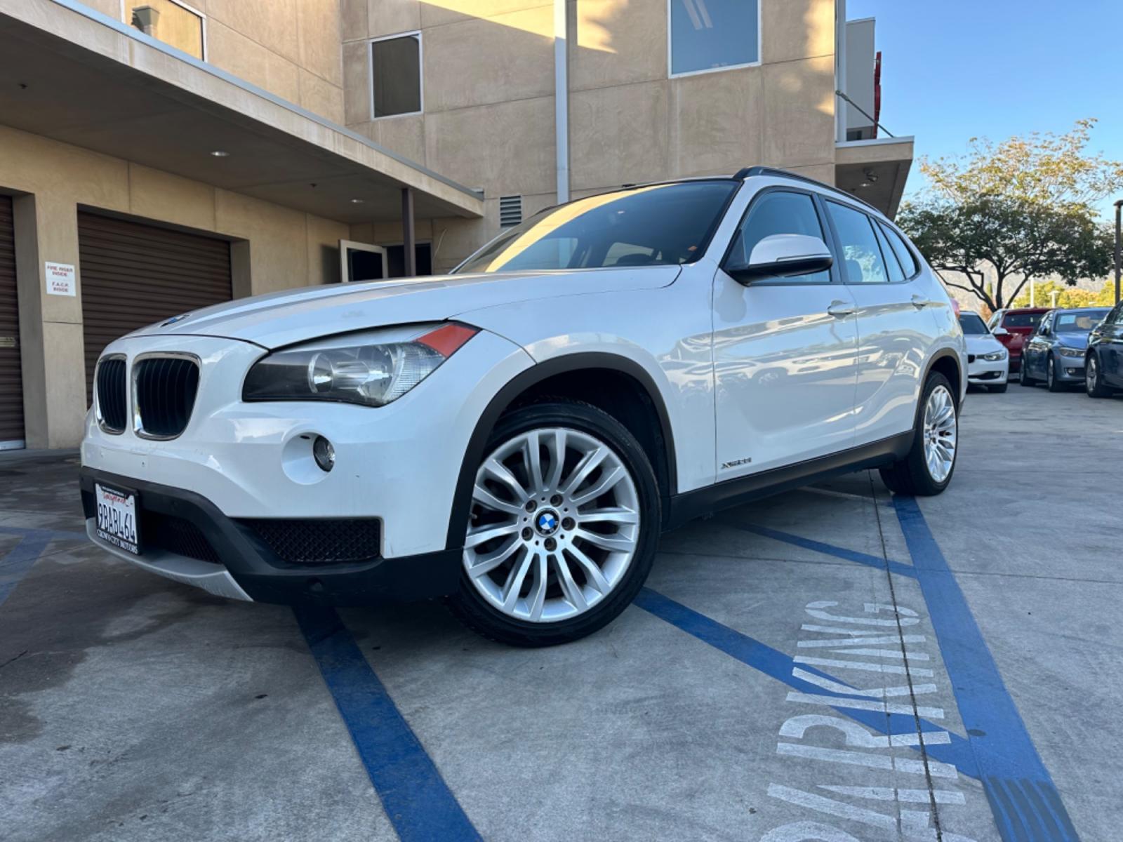 2014 WHITE /Black BMW X1 Leather (WBAVL1C56EV) with an 4 Cylinders engine, AUTOMATIC transmission, located at 30 S. Berkeley Avenue, Pasadena, CA, 91107, (626) 248-7567, 34.145447, -118.109398 - Don't let bad credit or financial setbacks hold you back from owning a luxury SUV like the 2014 BMW X1 xDrive28i. At our BHPH dealership, we're here to make the car-buying process as smooth and stress-free as possible. We invite you to visit our dealership in Pasadena, CA, to explore our inventory o - Photo #0